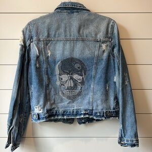 Distressed Blue Denim Jacket with bedazzled Skull. Size small